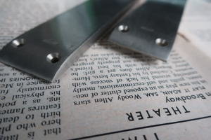 昭和レトロな小型シルバー押し板